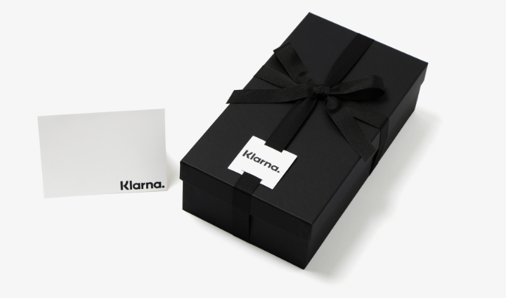 black gift box with black box and notecard